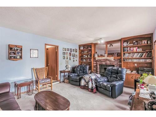 109 Hawkhill Road Nw, Calgary, AB - Indoor Photo Showing Living Room With Fireplace