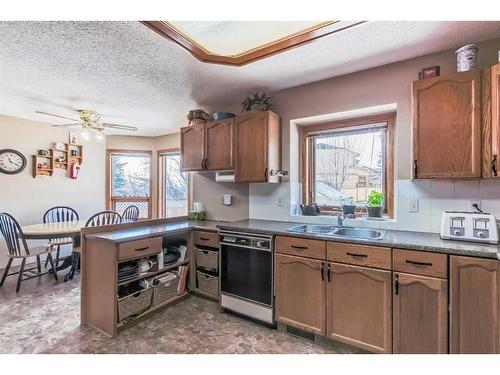 109 Hawkhill Road Nw, Calgary, AB - Indoor Photo Showing Kitchen With Double Sink