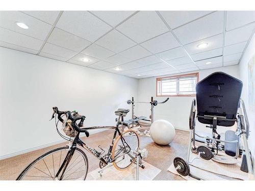 324 Coach Grove Place Sw, Calgary, AB - Indoor Photo Showing Gym Room