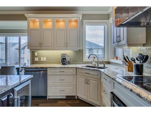 544 Evergreen Circle Sw, Calgary, AB - Indoor Photo Showing Kitchen With Double Sink With Upgraded Kitchen