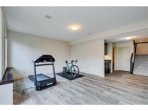 544 Evergreen Circle Sw, Calgary, AB - Indoor Photo Showing Gym Room