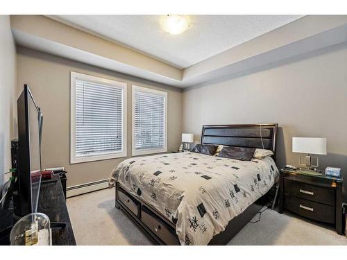 102-100 Cranfield Common Se, Calgary, AB - Indoor Photo Showing Bedroom