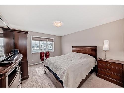 516 Panatella Square Nw, Calgary, AB - Indoor Photo Showing Bedroom