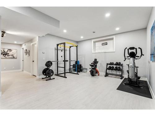 132 Fortress Bay Sw, Calgary, AB - Indoor Photo Showing Gym Room