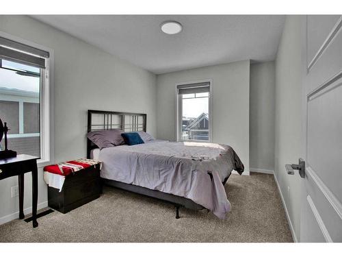 138 Creekside Way Sw, Calgary, AB - Indoor Photo Showing Bedroom