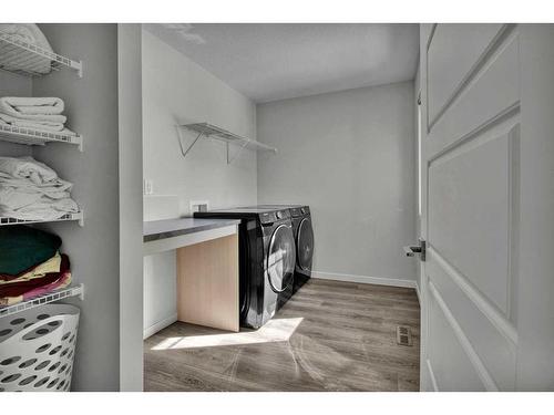 138 Creekside Way Sw, Calgary, AB - Indoor Photo Showing Laundry Room
