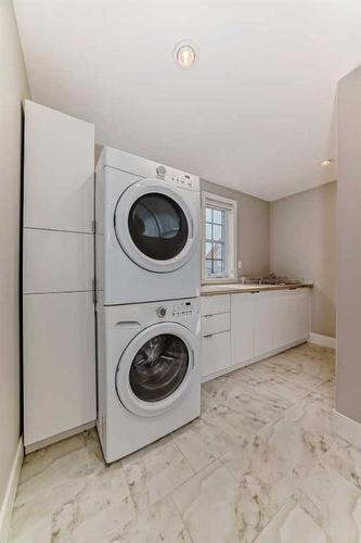 81 Tommy Prince Road Sw, Calgary, AB - Indoor Photo Showing Laundry Room