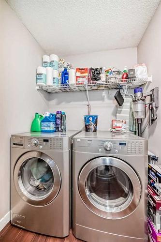 131 Cimarron Grove Circle, Okotoks, AB - Indoor Photo Showing Laundry Room