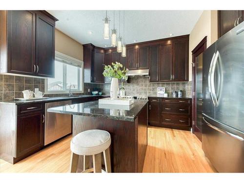 11 Lakes Estates Circle, Strathmore, AB - Indoor Photo Showing Kitchen With Stainless Steel Kitchen With Upgraded Kitchen