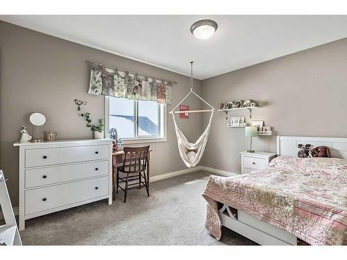 29 Westmount Circle, Okotoks, AB - Indoor Photo Showing Bedroom