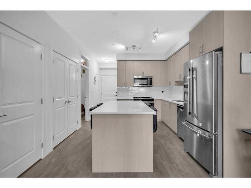 8306-151 Legacy Main Street Se, Calgary, AB - Indoor Photo Showing Kitchen With Stainless Steel Kitchen