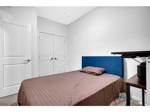 8306-151 Legacy Main Street Se, Calgary, AB - Indoor Photo Showing Bedroom
