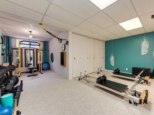 915 Ranch Estates Place Nw, Calgary, AB - Indoor Photo Showing Gym Room