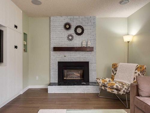 915 Ranch Estates Place Nw, Calgary, AB - Indoor Photo Showing Living Room With Fireplace
