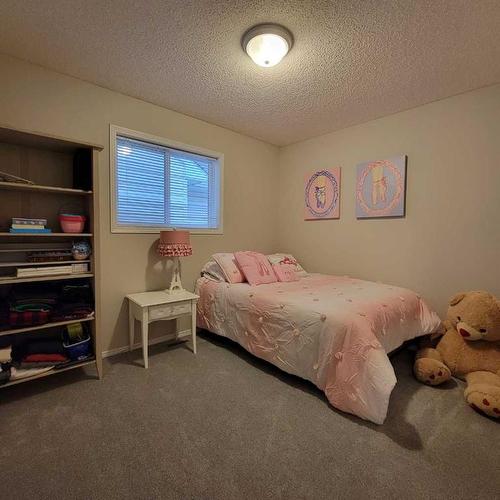 201 Tuscany Ravine Terrace, Calgary, AB - Indoor Photo Showing Bedroom