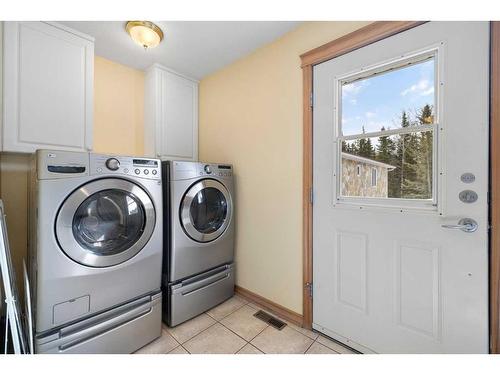64 Mountain Lion Place, Bragg Creek, AB - Indoor Photo Showing Laundry Room