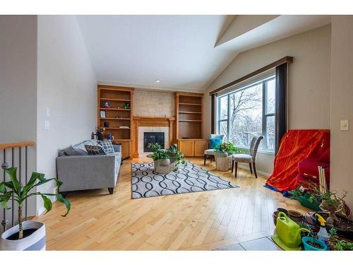 201 Auburn Glen Manor Se, Calgary, AB - Indoor Photo Showing Living Room With Fireplace