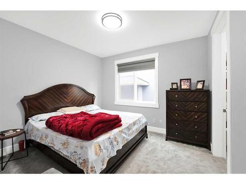 247 Kinniburgh Place, Chestermere, AB - Indoor Photo Showing Bedroom