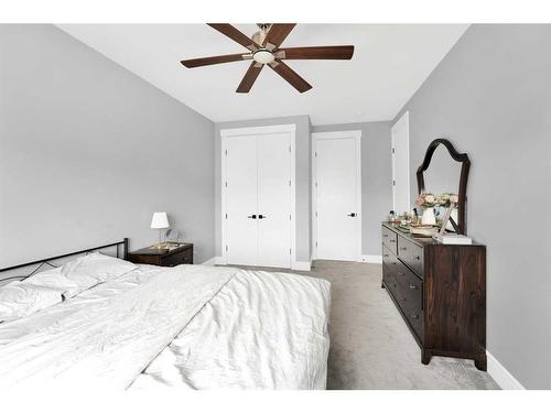 247 Kinniburgh Place, Chestermere, AB - Indoor Photo Showing Bedroom