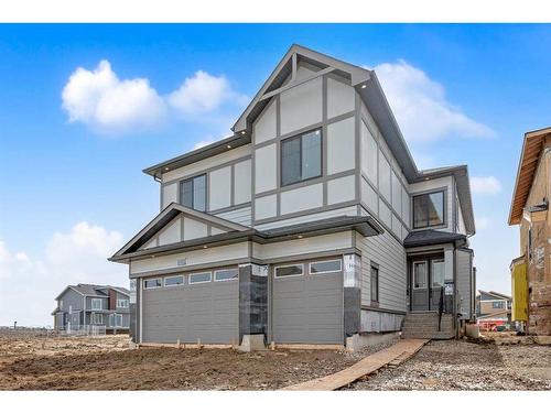 213 South Shore View, Chestermere, AB - Outdoor With Facade