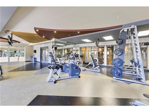 2502-11811 Lake Fraser Drive Se, Calgary, AB - Indoor Photo Showing Gym Room