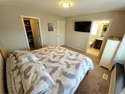 236 Silverado Range View Sw, Calgary, AB - Indoor Photo Showing Bedroom