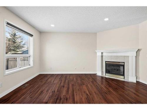127 Tarington Close Ne, Calgary, AB - Indoor Photo Showing Living Room With Fireplace