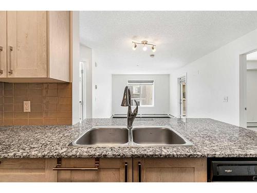 2308-4641 128 Avenue Ne, Calgary, AB - Indoor Photo Showing Kitchen With Double Sink