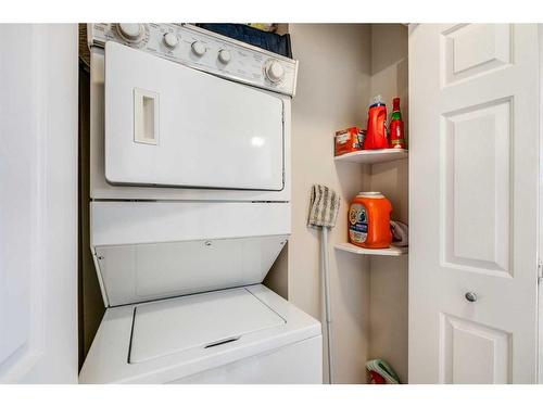 105 Eversyde Point Sw, Calgary, AB - Indoor Photo Showing Laundry Room