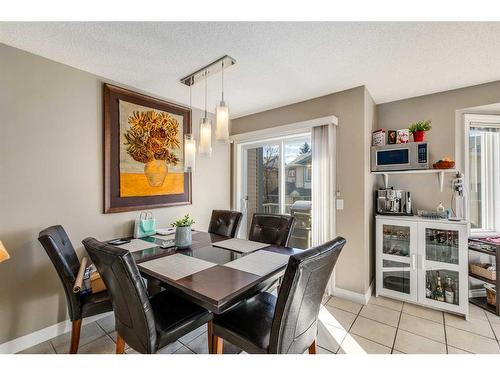 105 Eversyde Point Sw, Calgary, AB - Indoor Photo Showing Dining Room