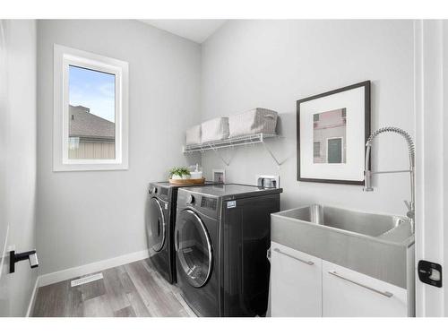 131 Marine Drive Se, Calgary, AB - Indoor Photo Showing Laundry Room