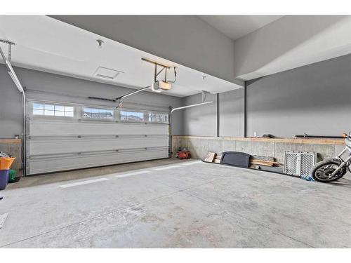 24 Mount Rae Terrace, Okotoks, AB - Indoor Photo Showing Garage
