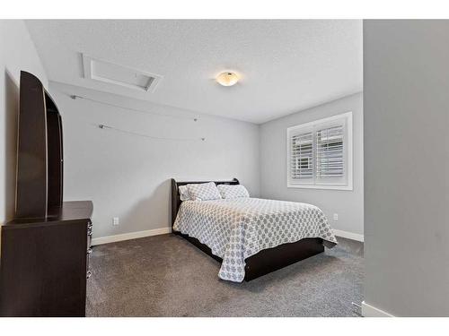 24 Mount Rae Terrace, Okotoks, AB - Indoor Photo Showing Bedroom