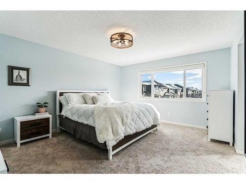 191 West Grove Way Sw, Calgary, AB - Indoor Photo Showing Bedroom