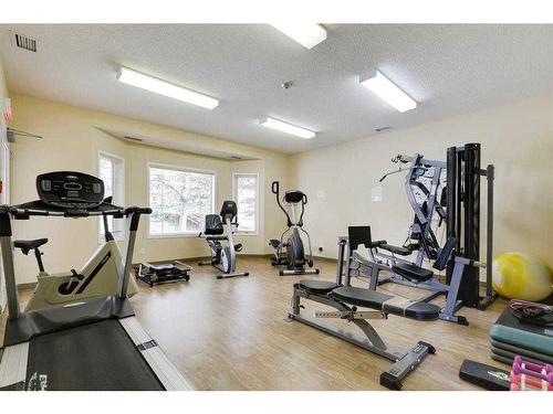 1205-1205 Sienna Park Green Sw, Calgary, AB - Indoor Photo Showing Gym Room
