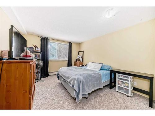 108B-7301 4A Street Sw, Calgary, AB - Indoor Photo Showing Bedroom