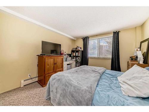 108B-7301 4A Street Sw, Calgary, AB - Indoor Photo Showing Bedroom