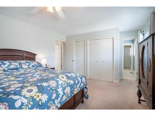 2419 Usher Road Nw, Calgary, AB - Indoor Photo Showing Bedroom