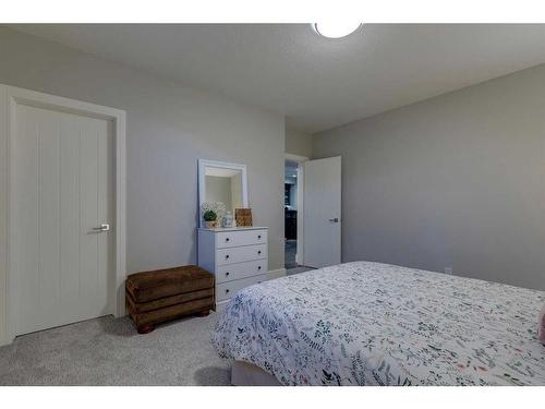 60 Cranbrook Landing Se, Calgary, AB - Indoor Photo Showing Bedroom
