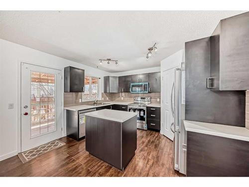 42 Bridlecreek Park Sw, Calgary, AB - Indoor Photo Showing Kitchen With Upgraded Kitchen