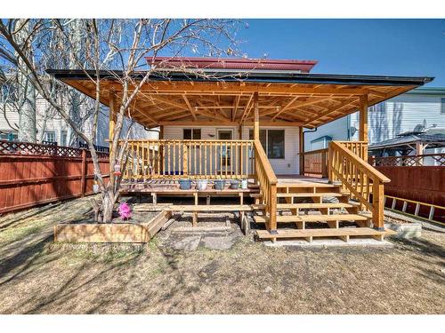 42 Bridlecreek Park Sw, Calgary, AB - Outdoor With Deck Patio Veranda
