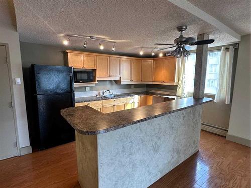315-340 14 Avenue Sw, Calgary, AB - Indoor Photo Showing Kitchen With Double Sink