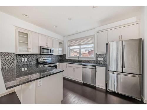 210 Redstone Drive Ne, Calgary, AB - Indoor Photo Showing Kitchen With Stainless Steel Kitchen With Upgraded Kitchen