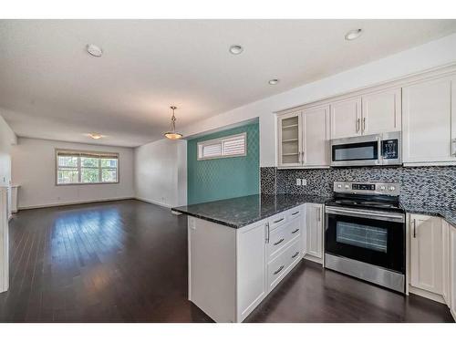 210 Redstone Drive Ne, Calgary, AB - Indoor Photo Showing Kitchen With Upgraded Kitchen