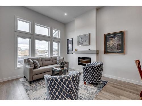 3 Larkspur Bend, Okotoks, AB - Indoor Photo Showing Living Room With Fireplace
