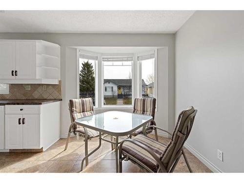 909 17 Street Se, High River, AB - Indoor Photo Showing Dining Room