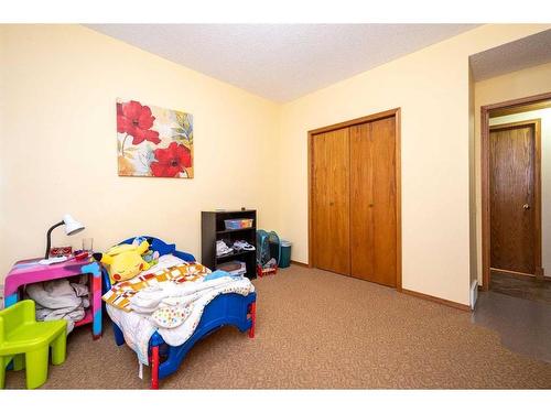 2985 100 Street Se, Calgary, AB - Indoor Photo Showing Bedroom