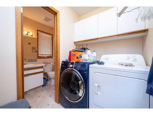 2985 100 Street Se, Calgary, AB - Indoor Photo Showing Laundry Room