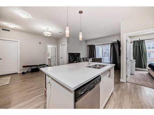 310-150 Auburn Meadows Manor Se, Calgary, AB - Indoor Photo Showing Kitchen With Double Sink