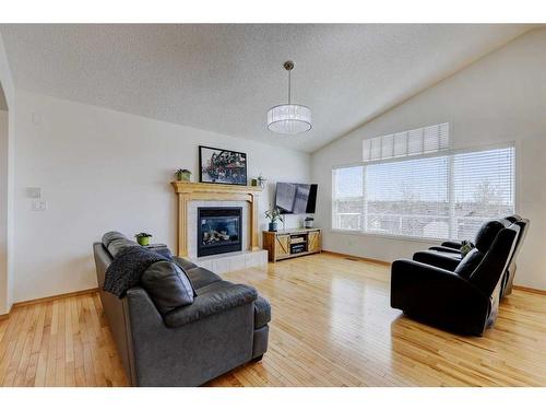 364 Springborough Way Sw, Calgary, AB - Indoor Photo Showing Living Room With Fireplace